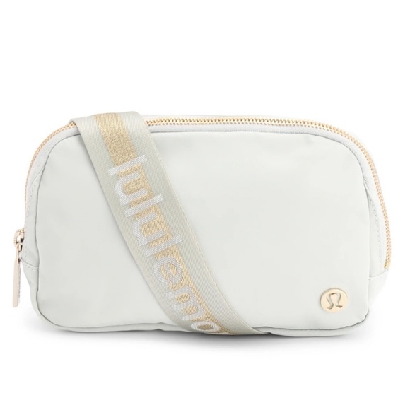 lululemon athletica Handbags - Lululemon Everywhere Belt Bag Vapor Gold White Wordmark Logo Crossbody Bag NWT
